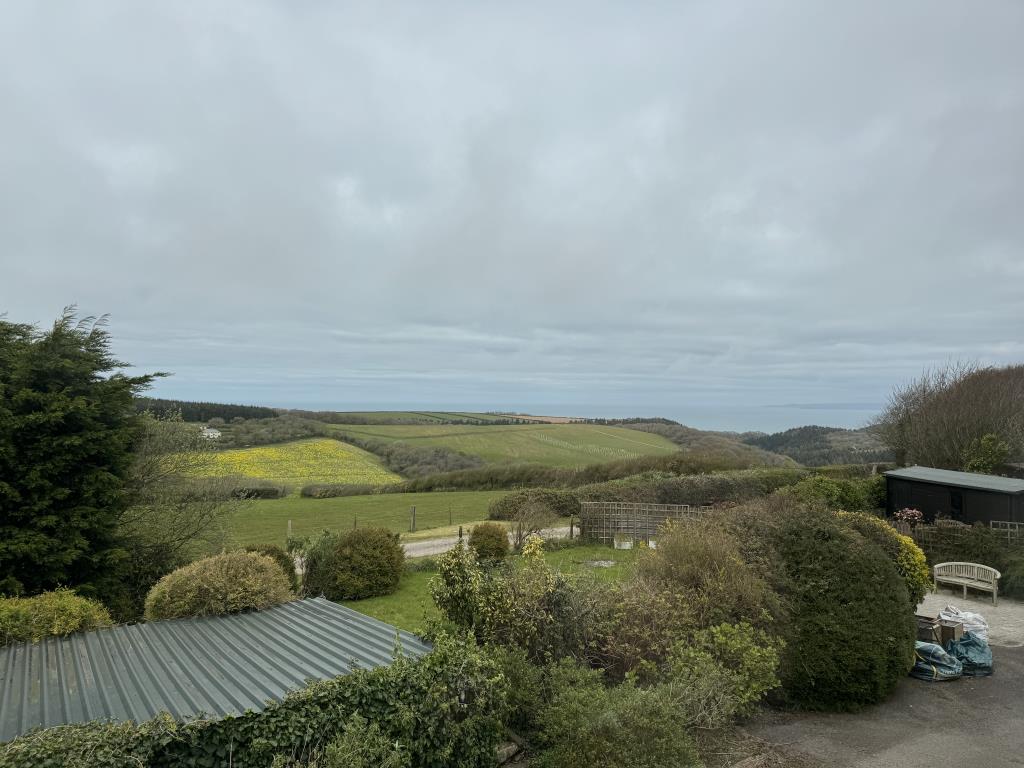 Lot: 49 - FIVE-BEDROOM FARMHOUSE FORMER BED & BREAKFAST PREMISES - Views of the garden, countryside and sea